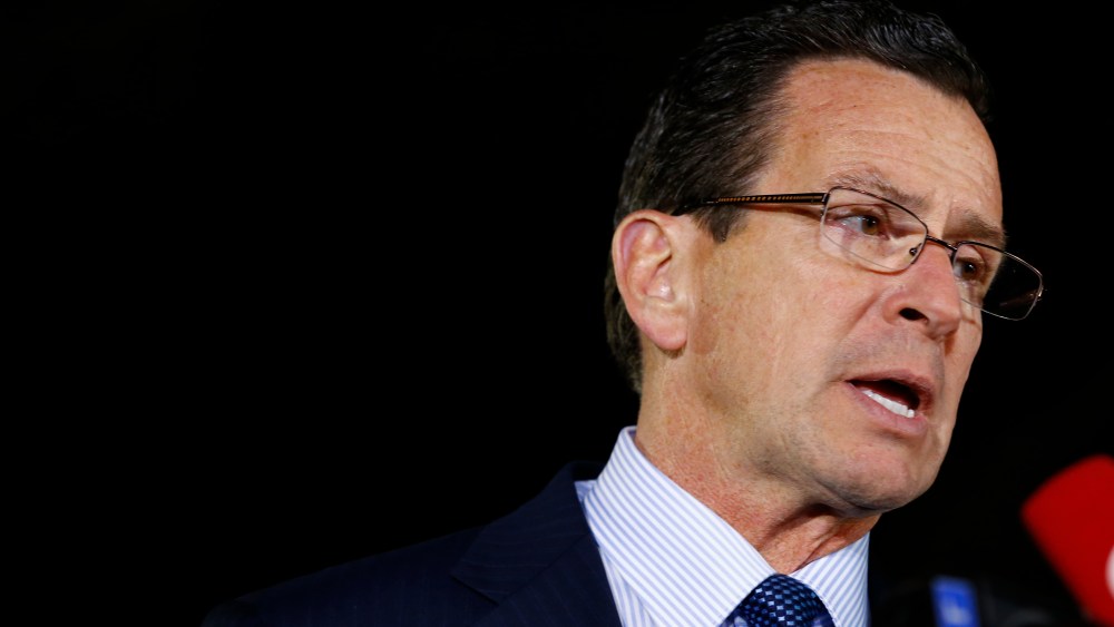 NEWTOWN, CT - DECEMBER 14:  Connecticut Gov. Dan Malloy briefs the media on the elementary school shootings during a press conference at Treadwell Memorial Park on December 14, 2012 in Newtown, Connecticut. (Photo by Jared Wickerham/Getty Images)