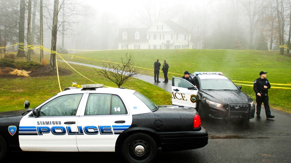 Police outside the home of Nancy Lanza, Dec. 18, 2012.