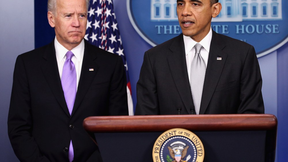 U.S. President Barack Obama (R) announces the creation of an interagency task force for guns as as Vice President Joseph Biden listens in the Brady Press Briefing Room at the White House on December 19, 2012 in Washington, DC. President Obama announced...