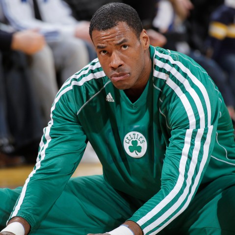 Jason Collins #98 of the Boston Celtics warms up in a game against the Golden State Warriors on December 29, 2012 at Oracle Arena in Oakland, California. (Photo by Rocky Widner/NBAE via Getty Images)
