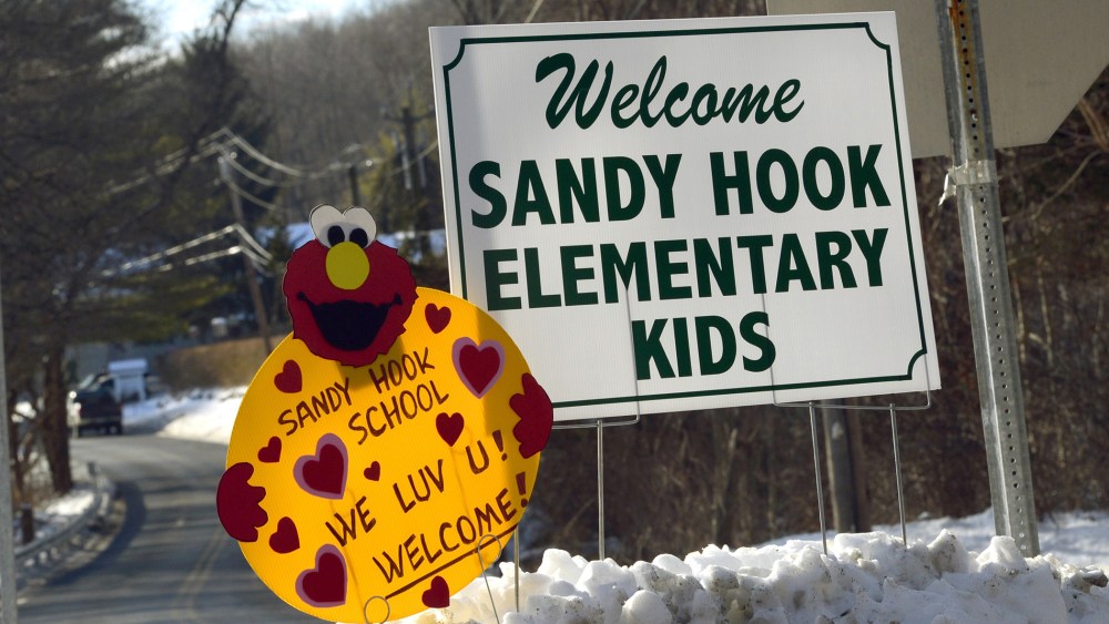 A sign welcoming children from Sandy Hook Elementry school sits on the road in Monroe, Connecticut on Jan. 3, 2013.
