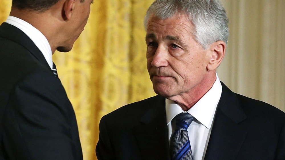 President Barack Obama shakes hands with former U.S. Sen. Chuck Hagel in the White House. Obama has nominated Hagel for the next Secretary of Defense. (Alex Wong / Getty Images)