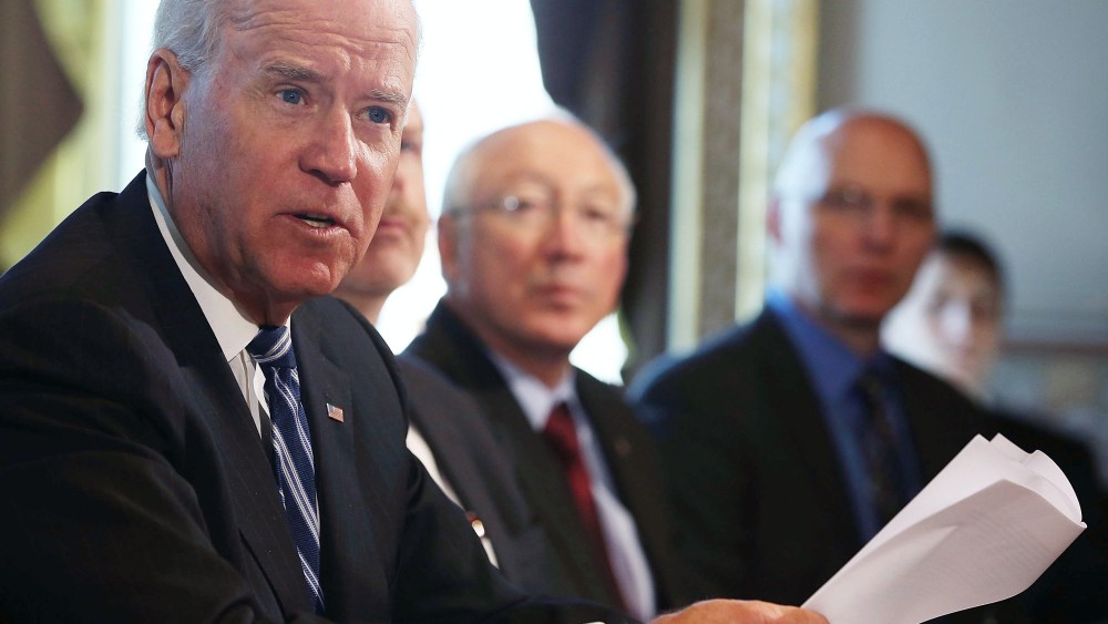 U.S. Vice President Joe Biden (L) makes brief remarks to the press after a meeting with Cabinet members and sportsmen's, wildlife and gun interest groups at the Eisenhower Executive Office Building January 10, 2013 in Washington, DC. U.S. President...