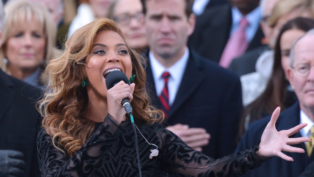 Beyonce performs the national anthem during the 57th Presidential Inauguration ceremonial swearing-in at the U.S. Capitol on January 21, 2013 in Washington, D.C. (Photo by Jewel Samad/AFP/Getty Images)