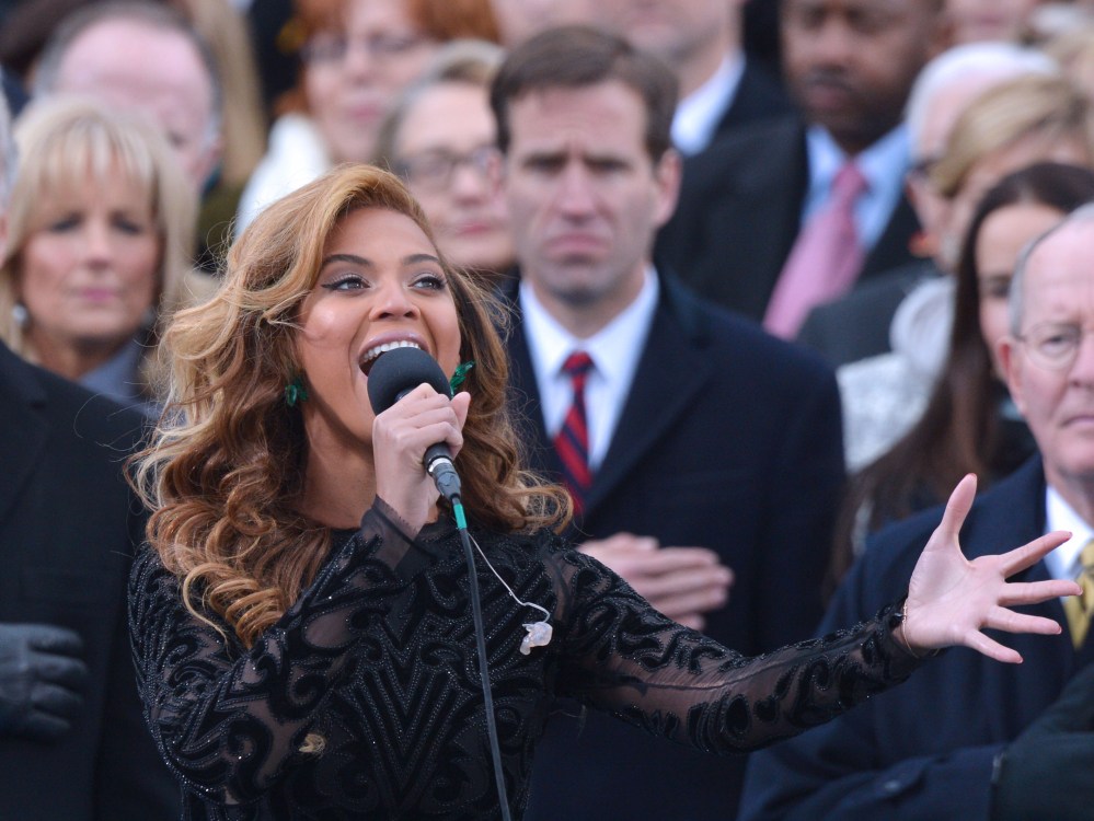 Beyonce performs the national anthem during the 57th Presidential Inauguration ceremonial swearing-in at the U.S. Capitol on January 21, 2013 in Washington, D.C. (Photo by Jewel Samad/AFP/Getty Images)
