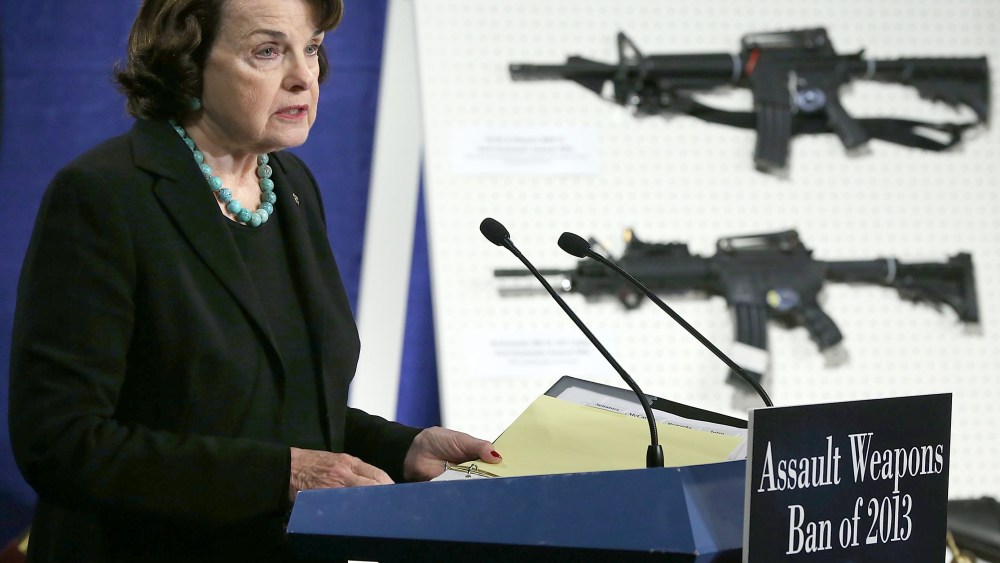 U.S. Senator Dianne Feinstein (D-CA) speaks next to a display of assault weapons during a news conference January 24, 2013 on Capitol Hill in Washington, DC. Feinstein announced that she will introduce a bill to ban assault weapons and high-capacity...
