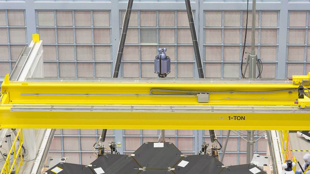 In this rare view, the James Webb Space Telescope's 18 mirrors are seen fully installed on the James Webb Space Telescope structure at NASA's Goddard Space Flight Center in Greenbelt, Maryland.