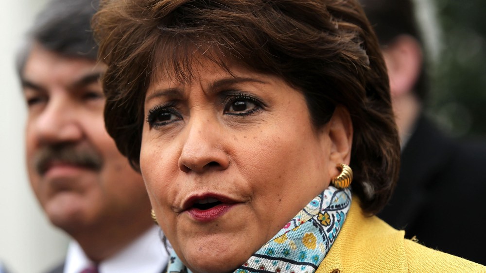 President and CEO of National Council of la Raza Janet Murguia (R) speaks to the press after a meeting with U.S. President Barack Obama at the White House, Feb. 5, 2013 in Washington, D.C.
