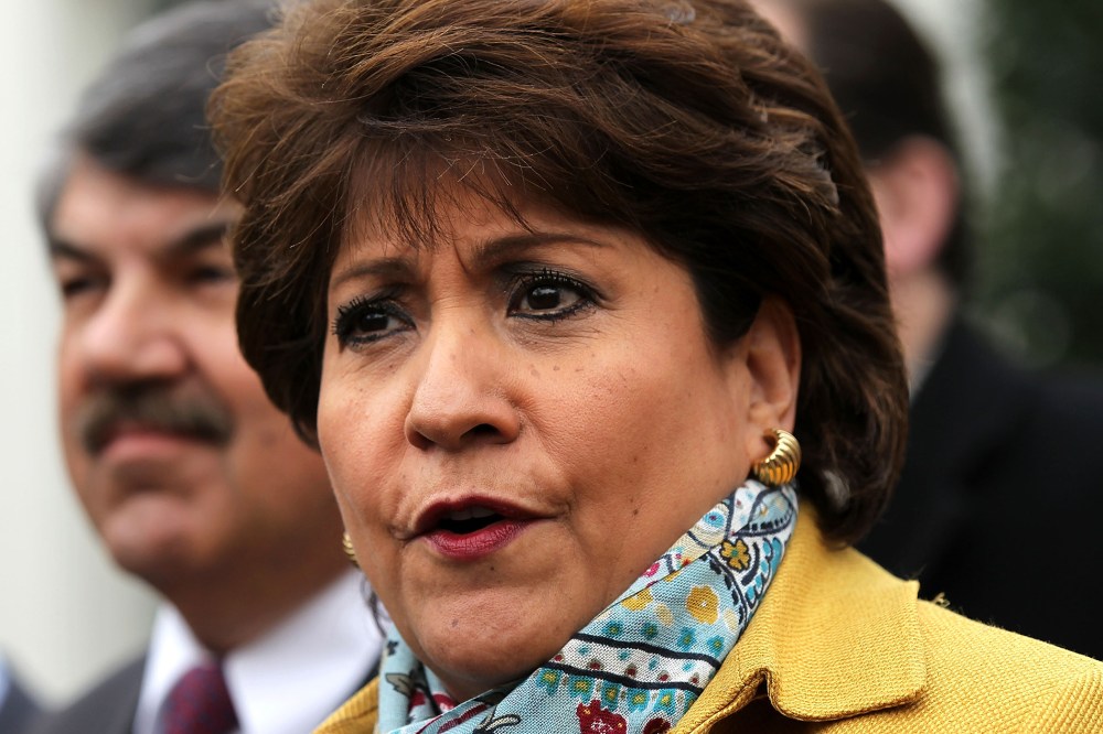 President and CEO of National Council of la Raza Janet Murguia (R) speaks to the press after a meeting with U.S. President Barack Obama at the White House, Feb. 5, 2013 in Washington, D.C.