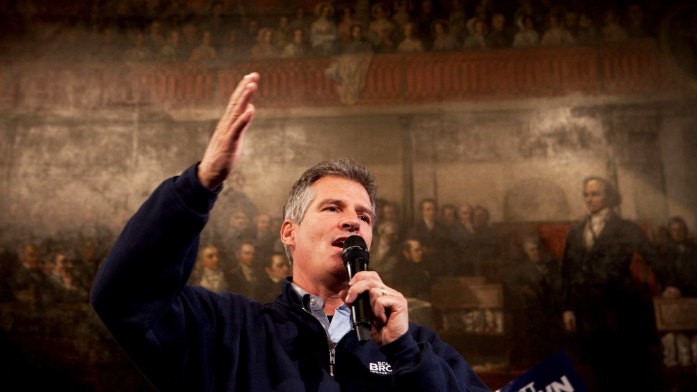 Former Massachusetts Senator Scott Brown speaks to the crowd during a rally at Faneuil Hall in Boston, Massachusetts on November 4, 2012.