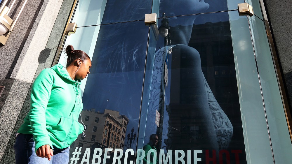 A woman stands near an Abercrombie and Fitch store on Feb. 22, 2013 in San Francisco, California.