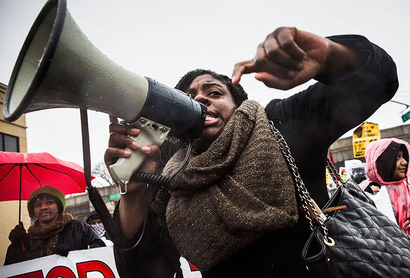 A woman marches against police stop-and-frisk tactics on February 23, 2013 in New York City.   (Photo by Andrew Burton/Getty Images)