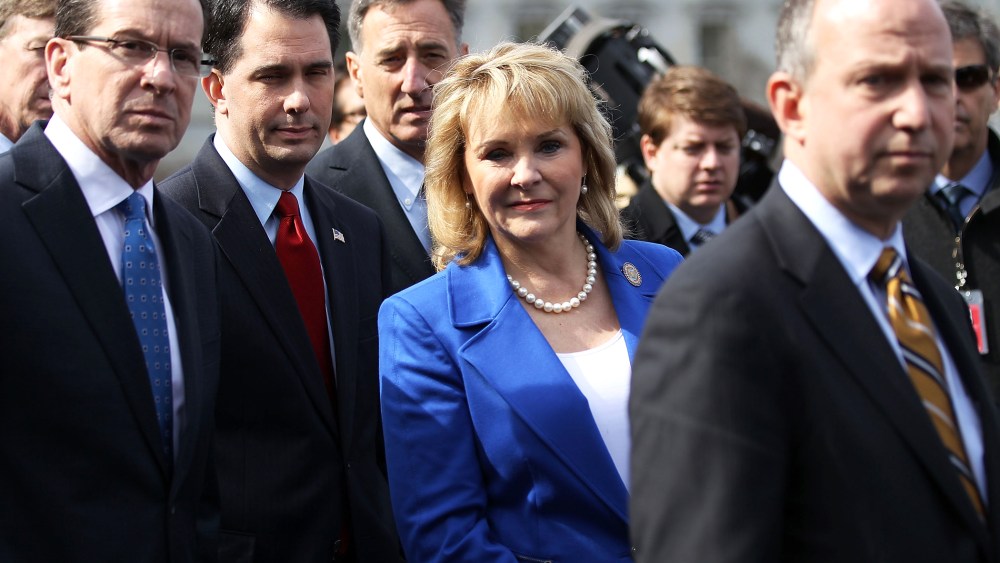 (L-R) Connecticut Governor Dan Malloy, Wisconsin Governor Scott Walker, Vermont Governor Peter Shumlin, and NGA Chairperson Mary Fallin, listen as they speak to members of the press in D.C., Feb. 25, 2013.