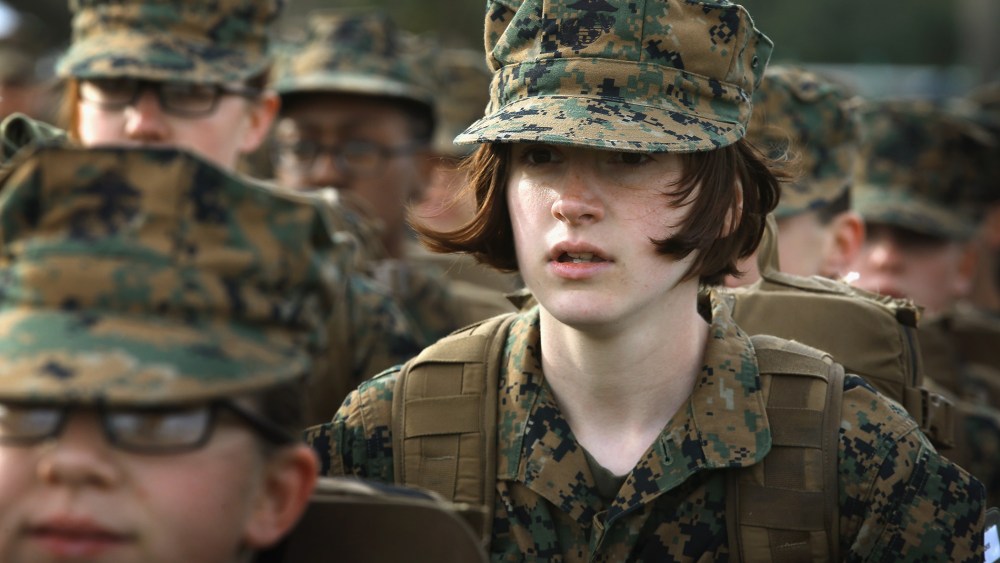 Marine Recruit Haley Evans from St Louis, Missouri stands in formation during boot camp February 27, 2013.