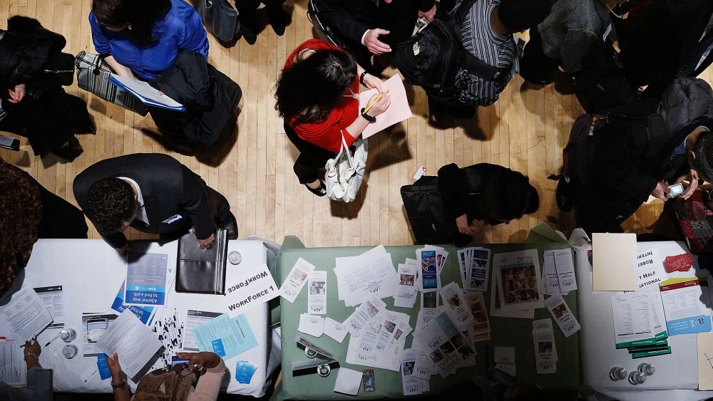 Job seekers attend a job fair at the Jewish Community Center in Manhattan, March 6, 2013.