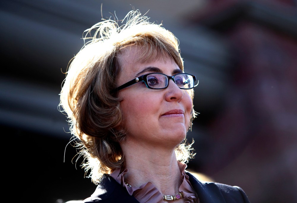Former Rep. Gabby Giffords attends a news conference outside Safeway grocery store where they asked Congress to provide stricter gun control in the United States, March 6, 2013 in Tucson, Ariz.