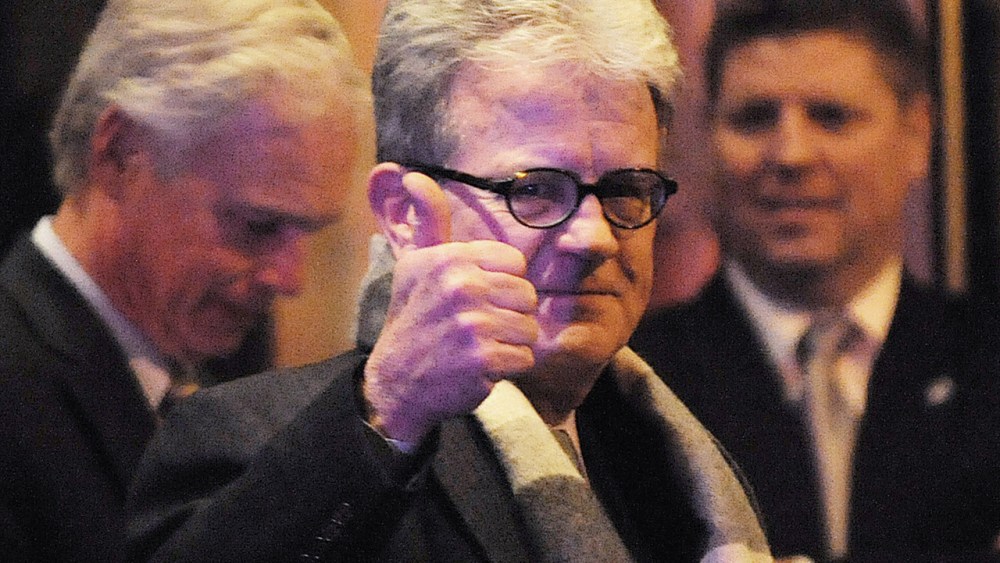 Sen. Tom Coburn gives a thumbs up as he leaves the Jefferson Hotel after a dinner with President Barack Obama. (Olivier Douliery-Pool/Getty Images)