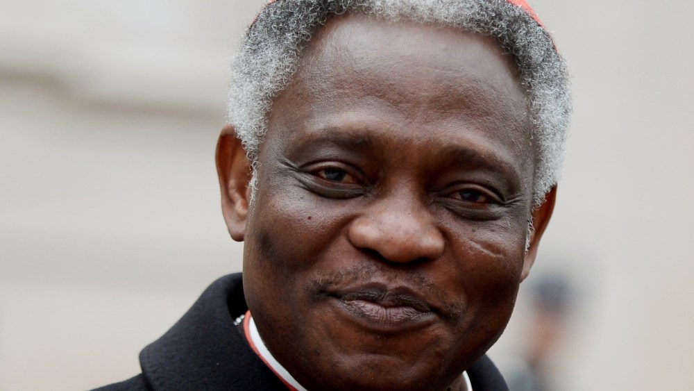 Ghanaian cardinal Peter Kodwo Appiah Turkson arrives to take part in an afternoon meeting of pre-conclave on March 8, 2013 at the Vatican. The day before, the next pope's ideal profile began to take shape as cardinals held a second day of pre-conclave...