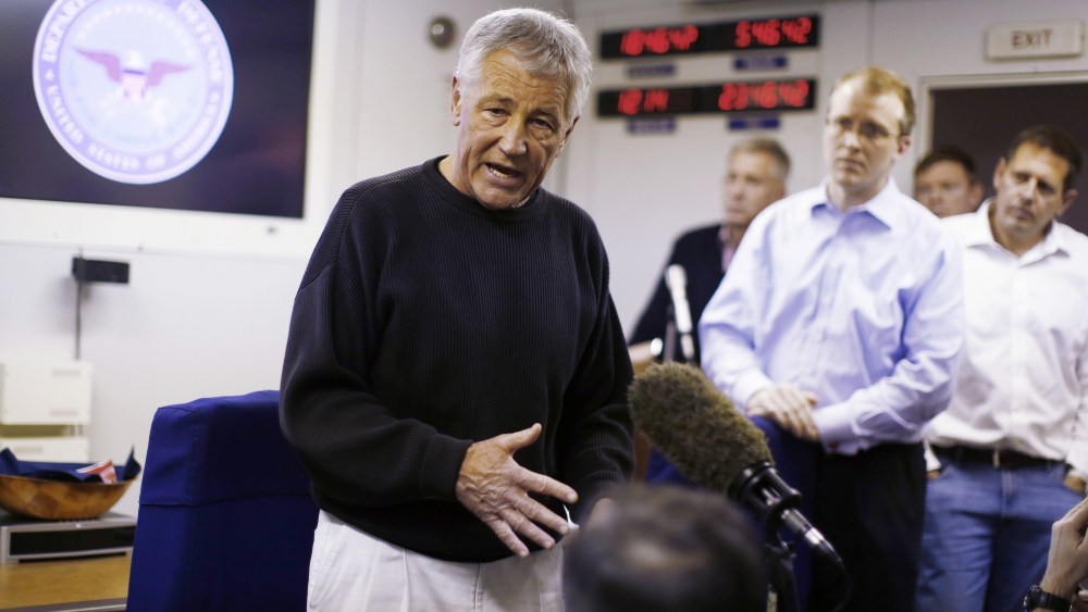 Hagel spoke to the traveling press aboard his military aircraft between Andrews Air Force Base and Manas Air Force Base, Kyrgyzstan, en route to Afghanistan. (Photo by Jason Reed-Pool/Getty Images)