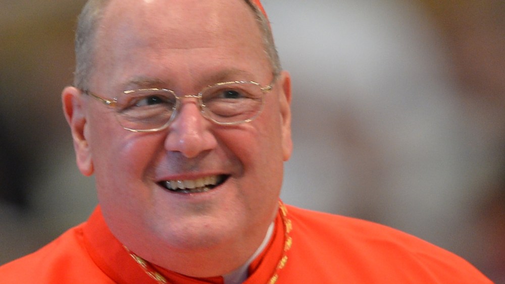 US cardinal Timothy Michael Dolan attends a mass at the St Peter's basilica before the conclave on March 12, 2013 at the Vatican. Cardinals moved into the Vatican today as the suspense mounted ahead of a secret papal election with no clear frontrunner...