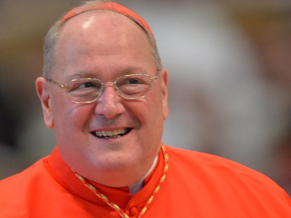 US cardinal Timothy Michael Dolan attends a mass at the St Peter's basilica before the conclave on March 12, 2013 at the Vatican. Cardinals moved into the Vatican today as the suspense mounted ahead of a secret papal election with no clear frontrunner...