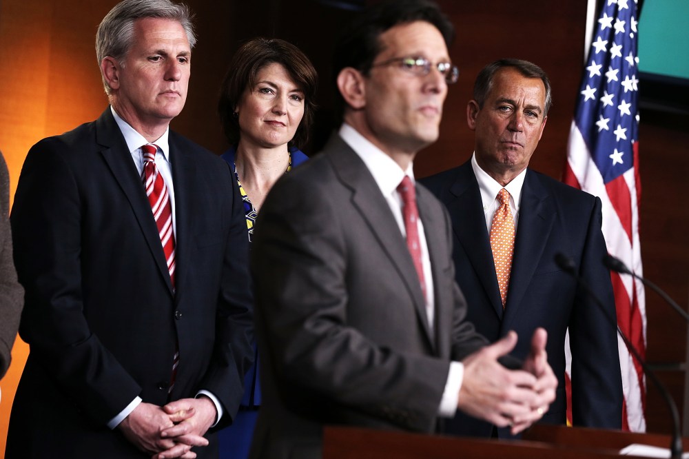 Eric Cantor speaks as John Boehner, House Majority Whip Rep. Kevin McCarthy and Rep. Cathy McMorris Rodgers look on during a news conference, March 13, 2013.