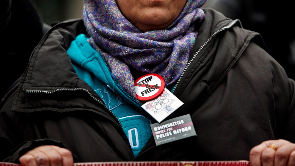A woman participates in a demonstration against the city's "stop and frisk" searches in lower Manhattan near Federal Court March 18, 2013 in New York City.