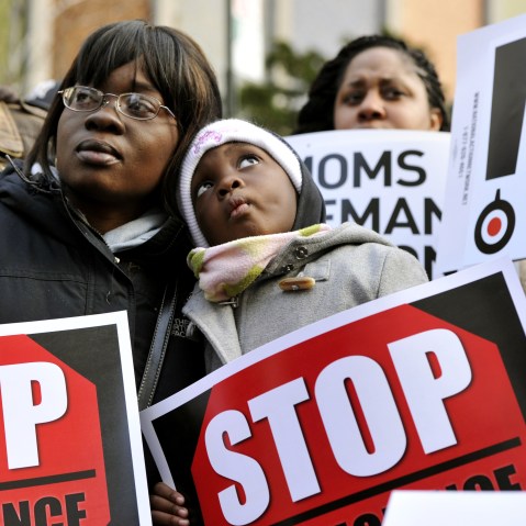 Demonstrators attend a rally and march to support federal and state gun control proposals on March 21, 2013 in the Harlem district of New York City.