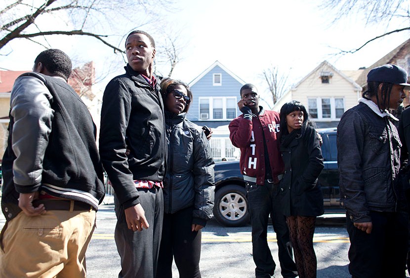 Friends and family of Kimani Gray, 16, watch as his casket is carried out after a funeral service on March 23, 2013 in the Brooklyn borough of New York City. Kimani Gray was shot and killed by New York police officers for allegedly pointing a gun at...