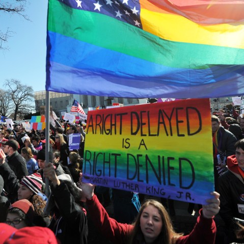 Same-sex marriage supporters shout slogans in front of the US Supreme Court on March 26, 2013 in Washington, DC. (Photo by Jewel Samad/AFP/Getty Images)