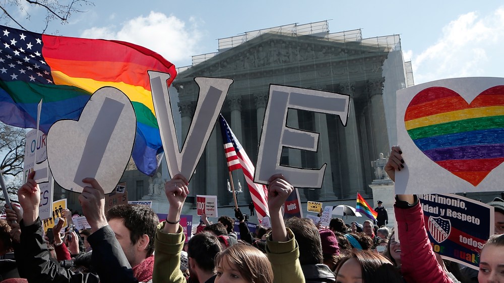 WASHINGTON, DC - MARCH 26:  Equal rights supporters demonstrate in front of the U.S. Supreme Court on March 26, 2013 in Washington, DC. The Supreme Court is hearing arguments March 26, in California's proposition 8, the controversial ballot initiative...