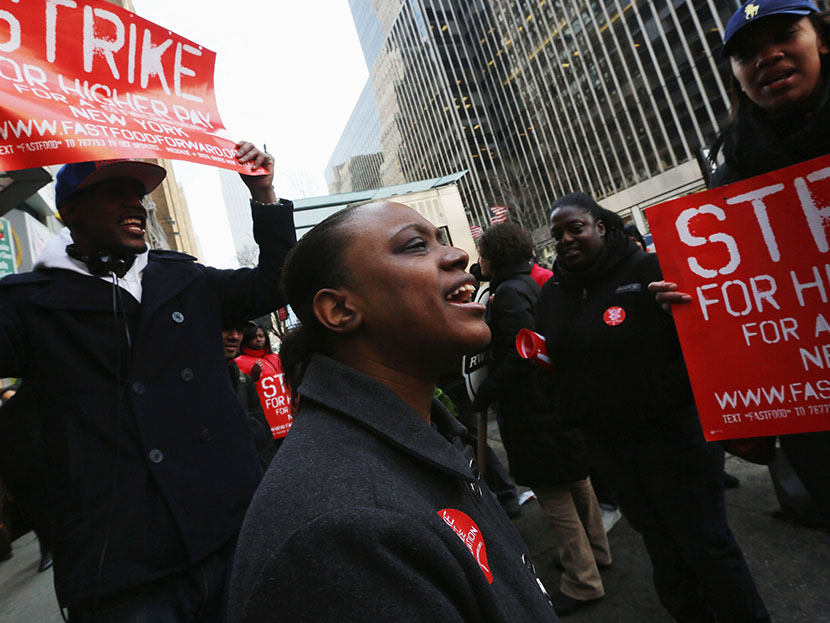 Fast food workers and supporters protest for better wages outside a Wendy's restaurant in Manhattan on April 4, 2013 in New York City. (Photo by Mario Tama/Getty Images)
