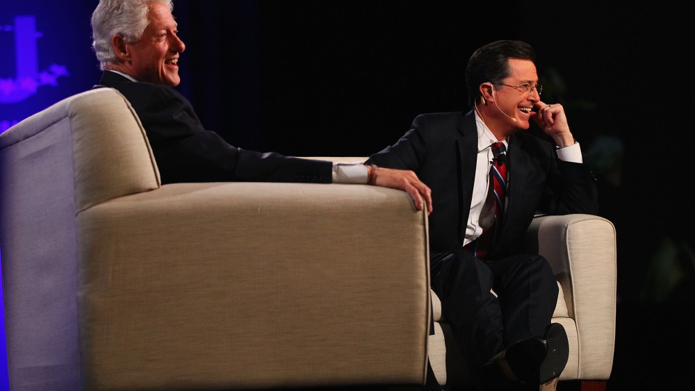 Former President Bill Clinton and TV personality Stephen Colbert take questions from the audience during the Clinton Global Initiative University at Washington University on April 6, 2013 in St Louis Missouri. (Photo by Dilip Vishwanat/Getty Images)