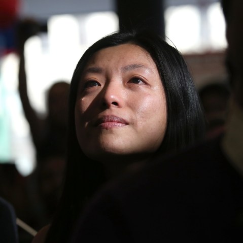 Chinese immigrant and new American citizen Yi Shu sheds a tear after taking the oath of citizenship at a naturalization ceremony on April 9, 2013 in New York City.