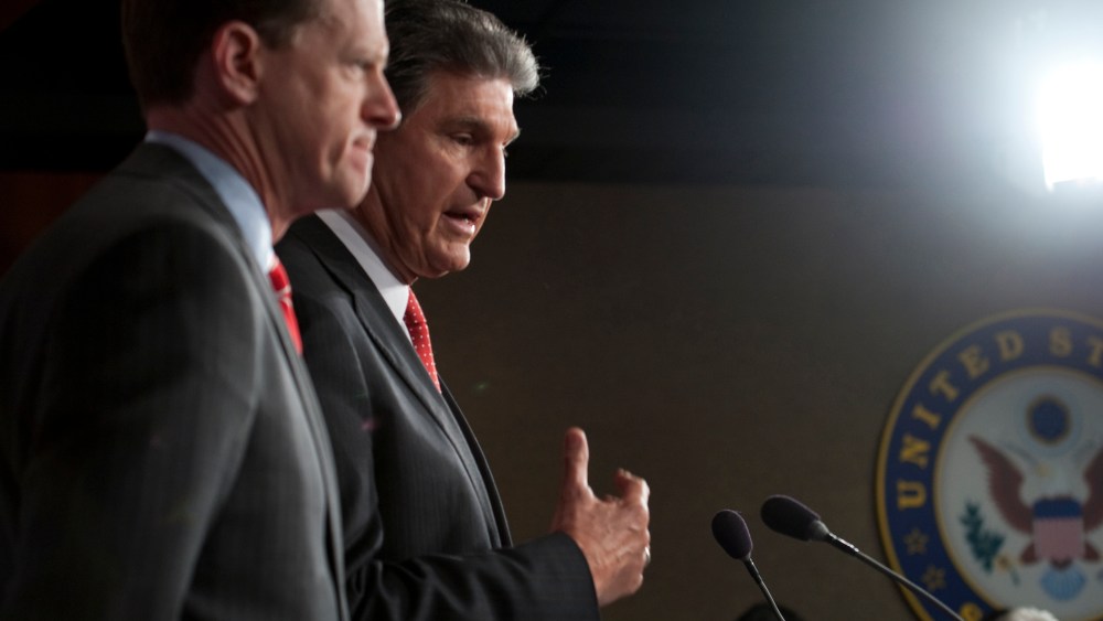 Sen. Pat Toomey, R-Pa., and Sen. Joe Manchin, D-W.V., speak at a press conference about their bi-partisan agreement to propose legislation to strengthen background checks to prevent criminals and those with mental illness from buying guns on April 10,...