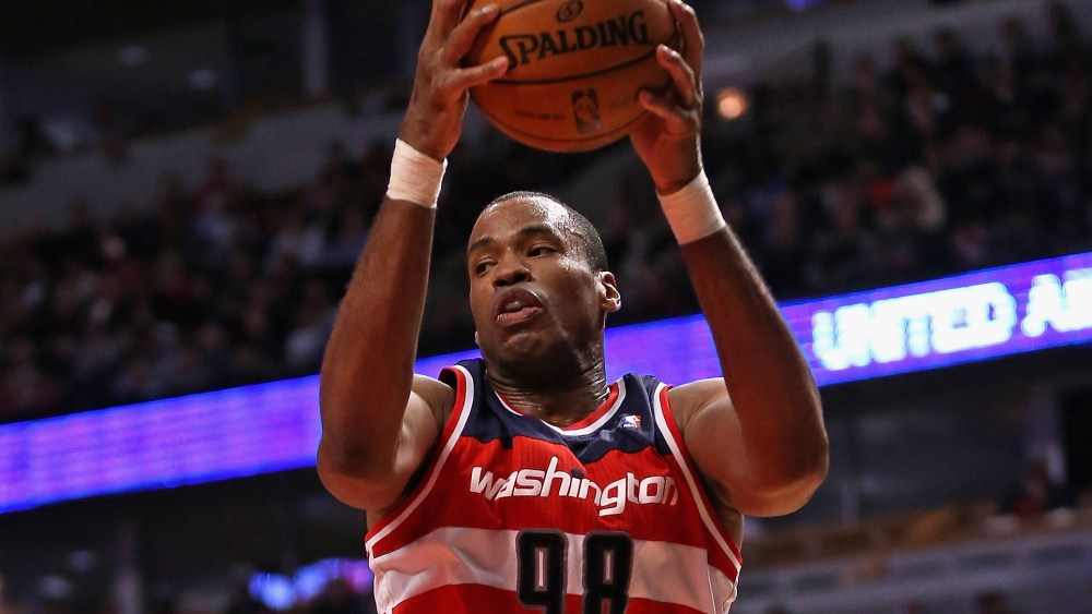 Jason Collins #98 of the Washington Wizards rebounds against the Chicago Bulls at the United Center on April 17, 2013 in Chicago, Illinois. (Photo by Jonathan Daniel/Getty Images)
