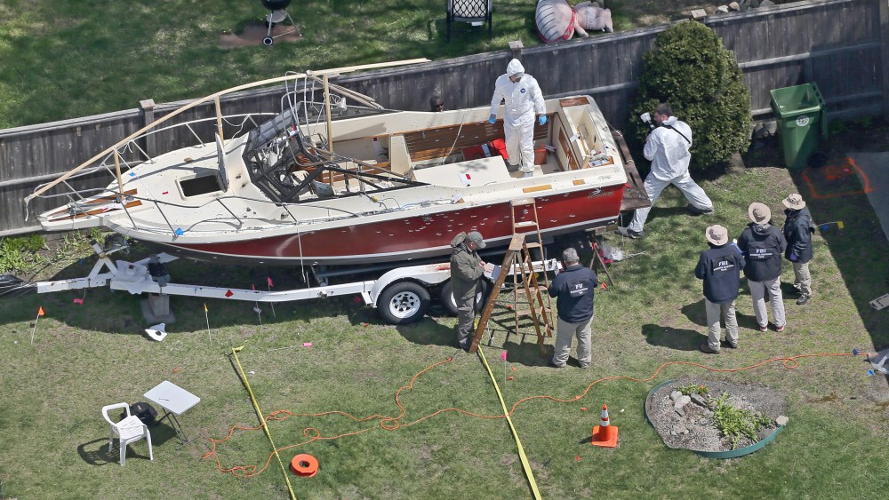 Aerial view of the boat where one of the Boston Marathon bombing suspects was found in Watertown, Mass. (Photo by David L Ryan/The Boston Globe via Getty Images)