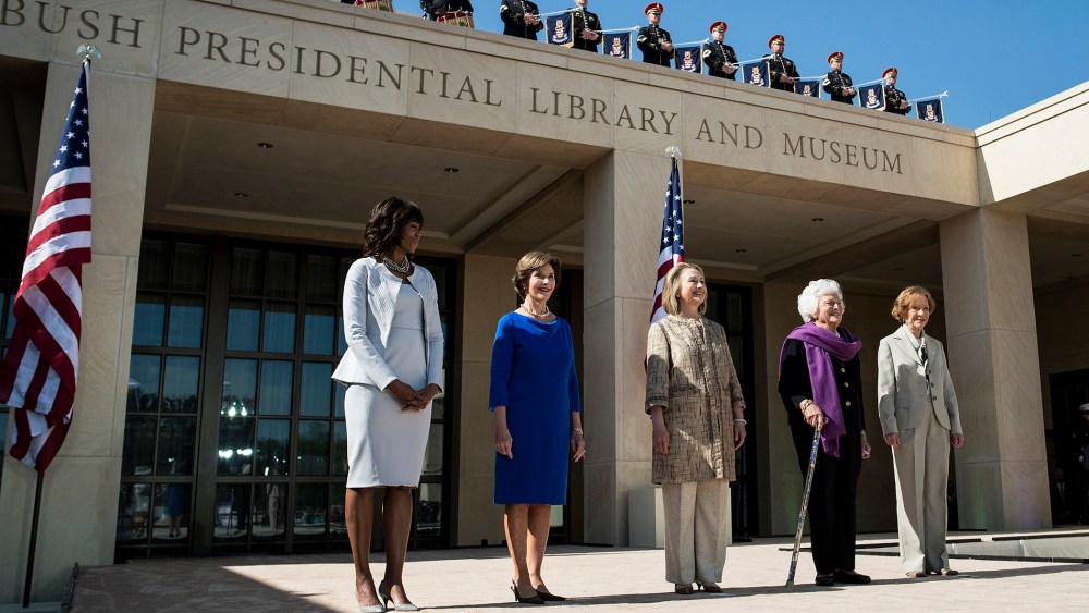 From left US first lady Michelle Obama, stands with former first ladies Laura Bush, Hillary Clinton, Barbara Bush and Rosalynn Carter as they arrive for a dedication ceremony at the George W. Bush Library and Museum, April 25, 2013 in Dallas, Texas.
