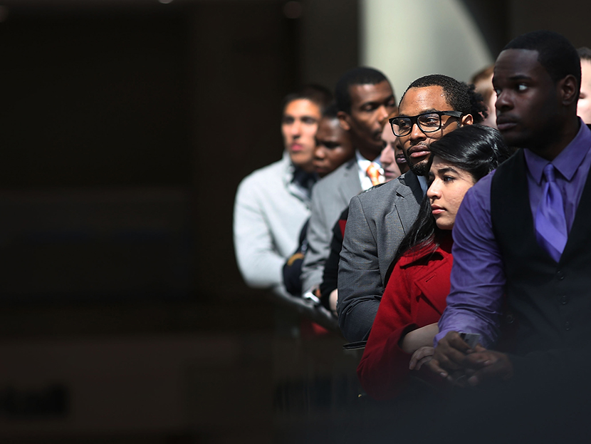Job seekers wait in line to meet with employers at the 25th Annual CUNY big Apple Job and Internship Fair at the Jacob Javits Convention Center on April 26, 2013 in New York City.  (Photo by Spencer Platt/Getty Images)
