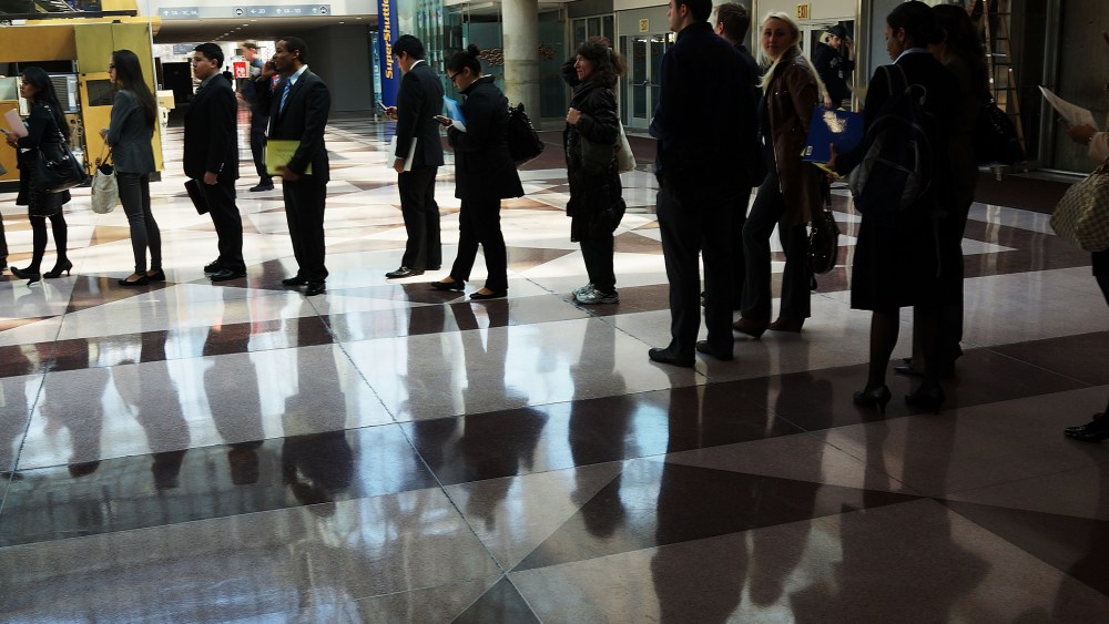 Job seekers wait in line to meet with employers at the 25th Annual CUNY big Apple Job and Internship Fair at the Jacob Javits Convention Center on April 26, 2013 in New York, NY.