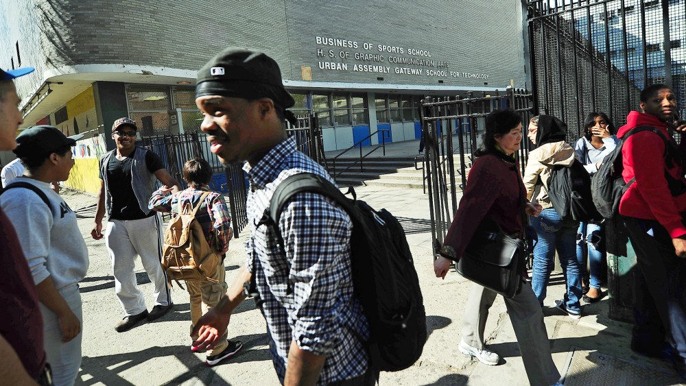 High school students leave the High School of Graphic Communication Arts in New York on April, 30, 2013