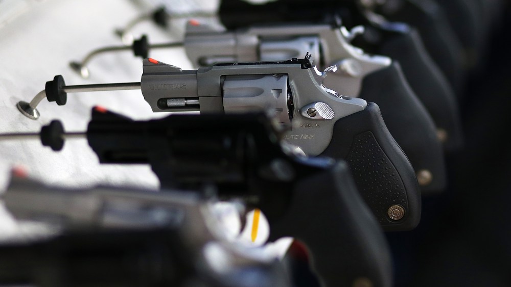 Handguns are seen on display at an event in Houston, Texas.