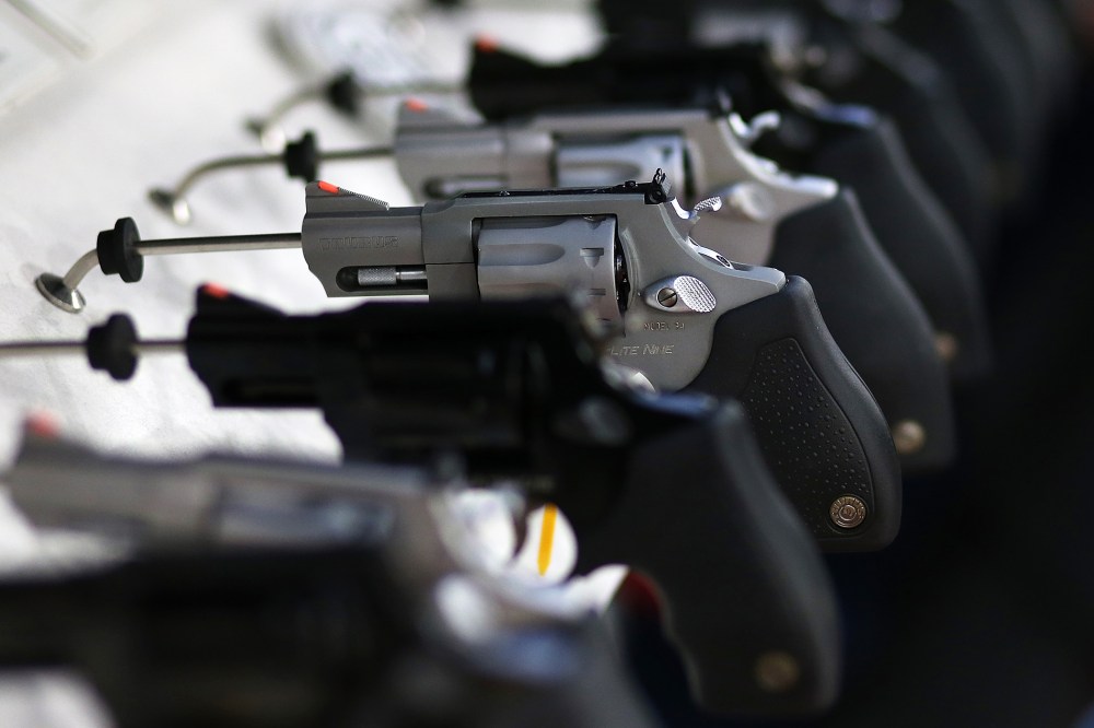 Handguns are seen on display at an event in Houston, Texas.