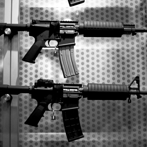Assault rifles are displayed during the 2013 NRA Annual Meeting and Exhibits, May 4, 2013.