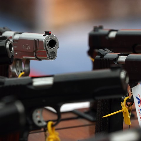 Handguns are displayed in the Remington booth during the 2013 NRA Annual Meeting and Exhibits on May 5, 2013 in Houston, Texas. (Photo by Justin Sullivan/Getty)