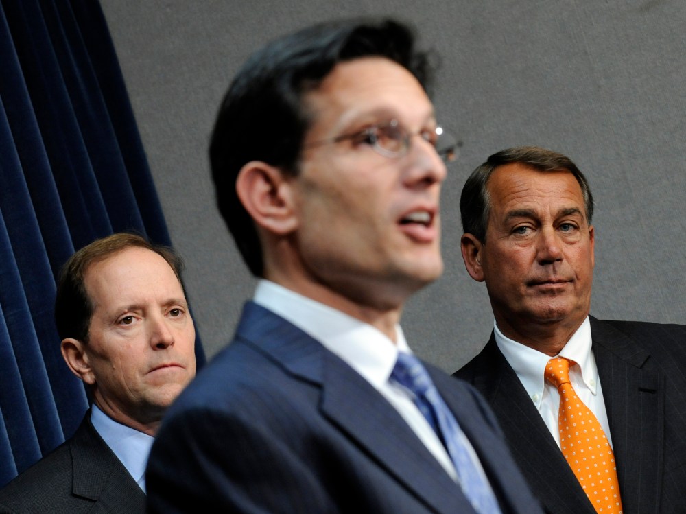 House Speaker John Boehner, right, and Rep. Dave Camp, left,  listen as House Majority Leader Eric Cantor, speaks on Capitol Hill in Washington, D.C., January 21, 2009.