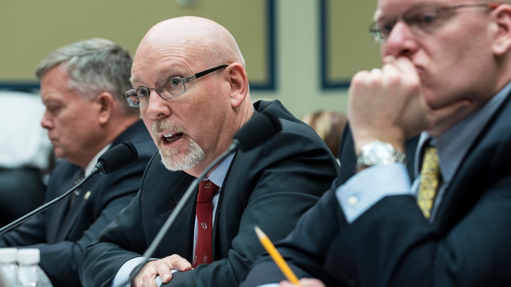 Gregory Hicks (C), Foreign Service Officer and former Deputy Chief of Mission/Charge Affairs in Libya, speaks while Mark Thompson (L), acting Deputy Assistant Secretary for Counter terrorism at the US State Department, and Eric Nordstrom, Diplomatic...