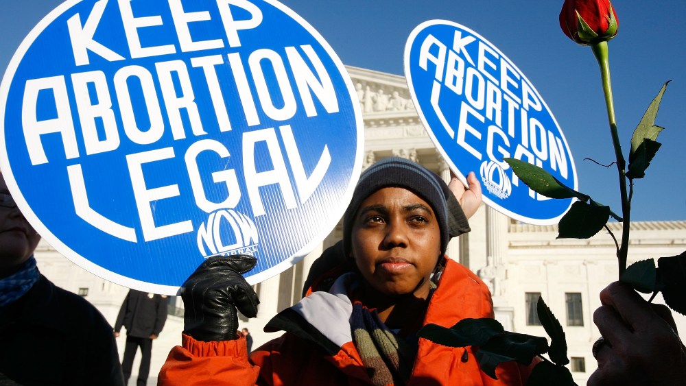 Image: A local pro-choice activist in front of the U.S. Supreme Court in Washington, D.C. January 22, 2009.