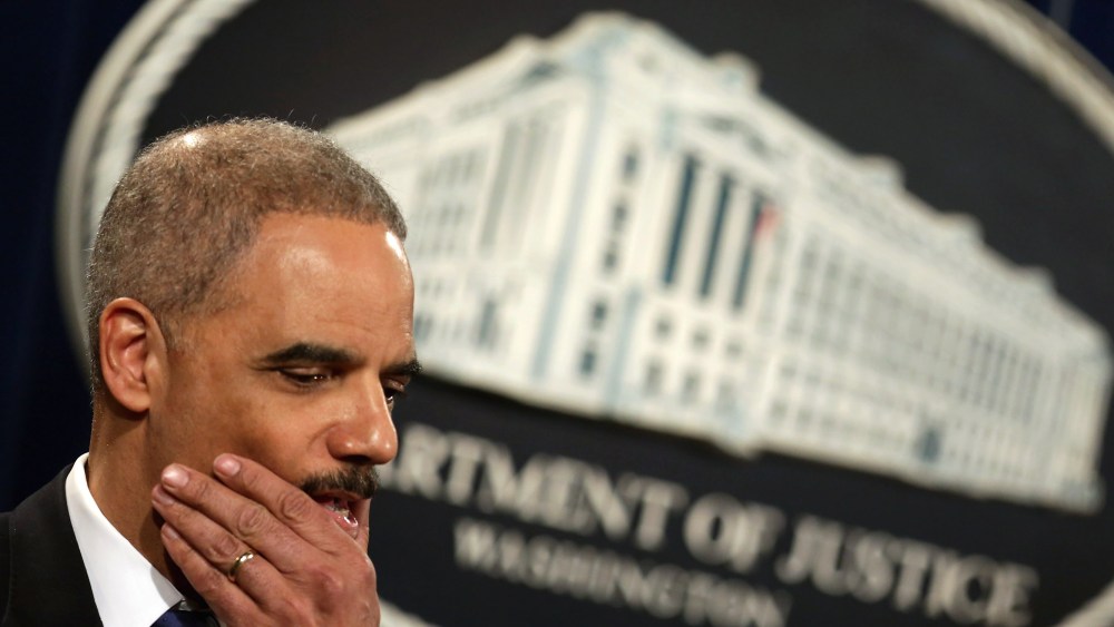 File Photo: U.S. Attorney General Eric Holder holds a news conference about efforts by the Justice Department and the Health and Human Services Department to combat Medicare fraud at the Justice Department May 14, 2013 in Washington, DC. (Photo by Chip...