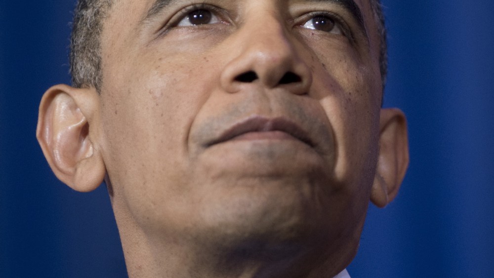 President Barack Obama speaks about his administration's drone and counterterrorism policies, as well as the military prison at Guantanamo Bay, at the National Defense University in Washington, D.C., May 23, 2013. (Photo by Saul Loeb/AFP/Getty Images)